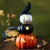  Accenti decorativi per interni | Zucche di Jack O'lantern in resina a LED da 10,35" con decorazione da tavolo a forma di corvo Plow & Hearth