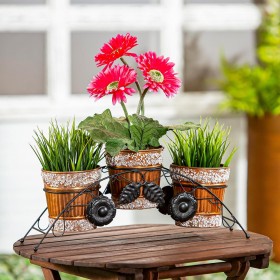  Jardineras y soportes para exteriores | Jardineras metálicas Plow & Hearth con adornos de piedra y soporte